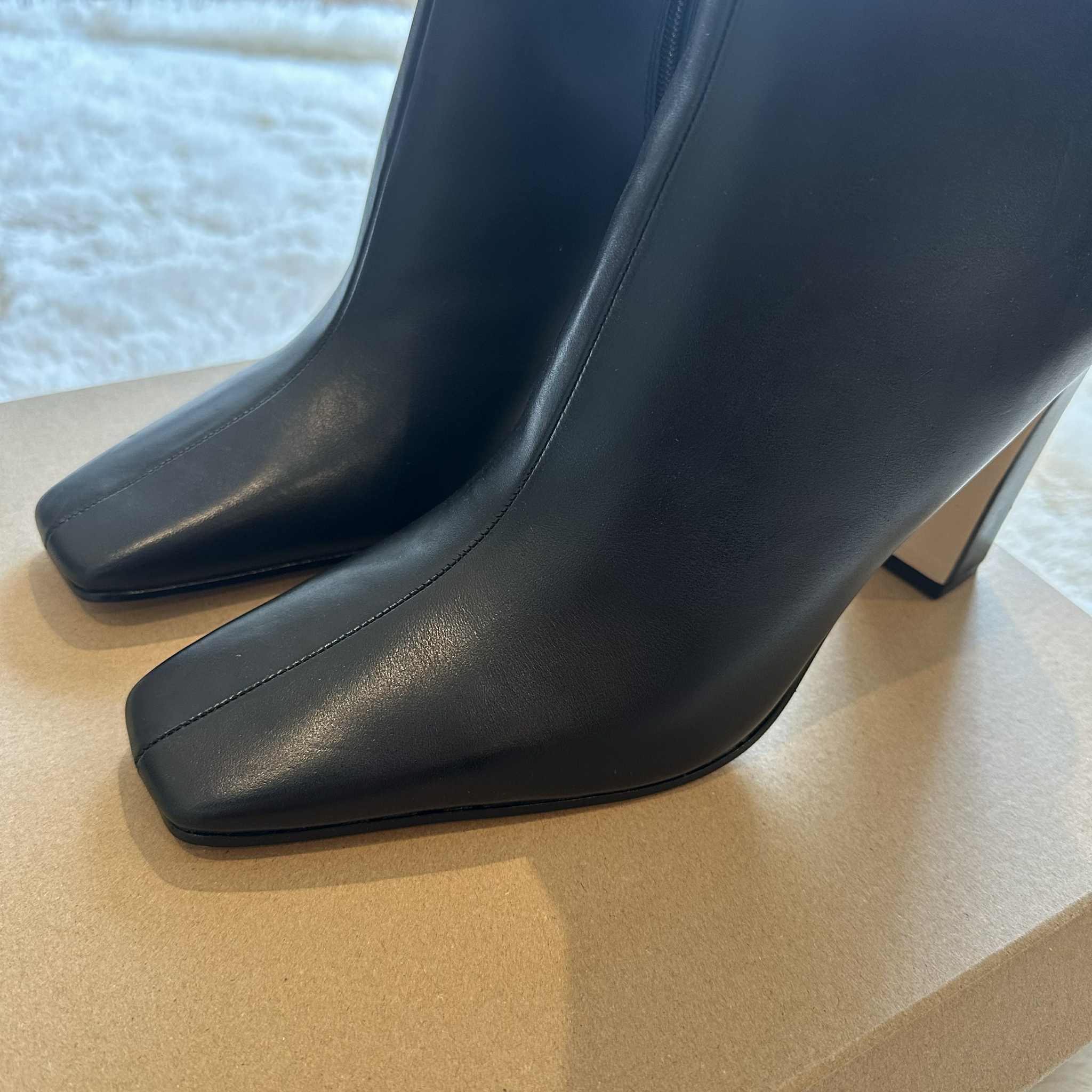 Sleek black ankle boots by Steve Madden