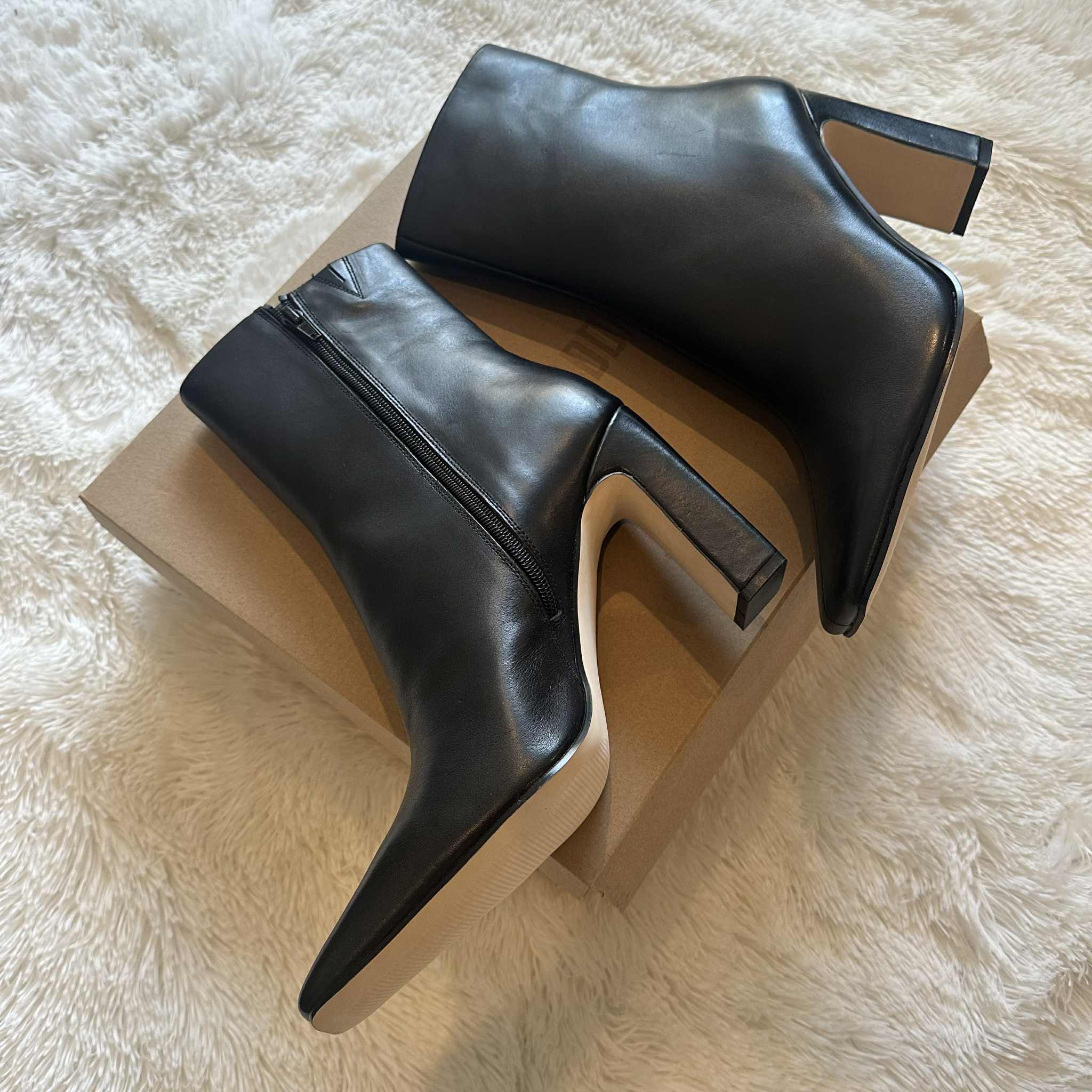 Sleek black ankle boots by Steve Madden